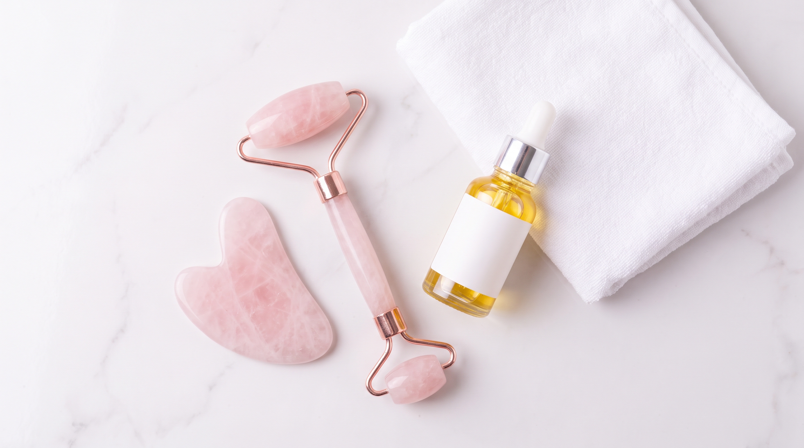 Rose Quartz Facial Roller and Gua Sha How to Use a Rose Quartz Facial Roller and Gua Sha